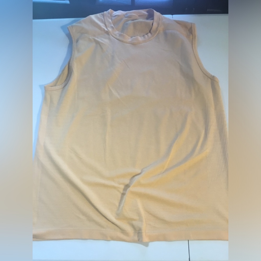 Lululemon men’s tank top. Gently used. Size large. Light orange